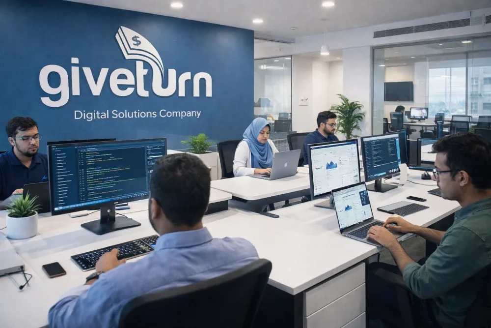 GiveTurn developers collaborating at the company's digital solutions office in Dhaka