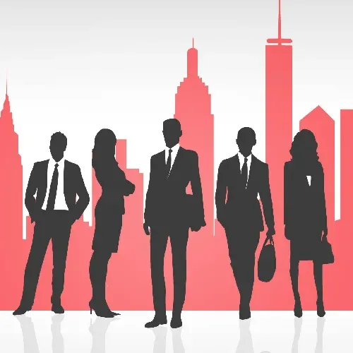 Silhouettes of business professionals standing in front of a city skyline, representing GiveTurn's corporate web development solutions